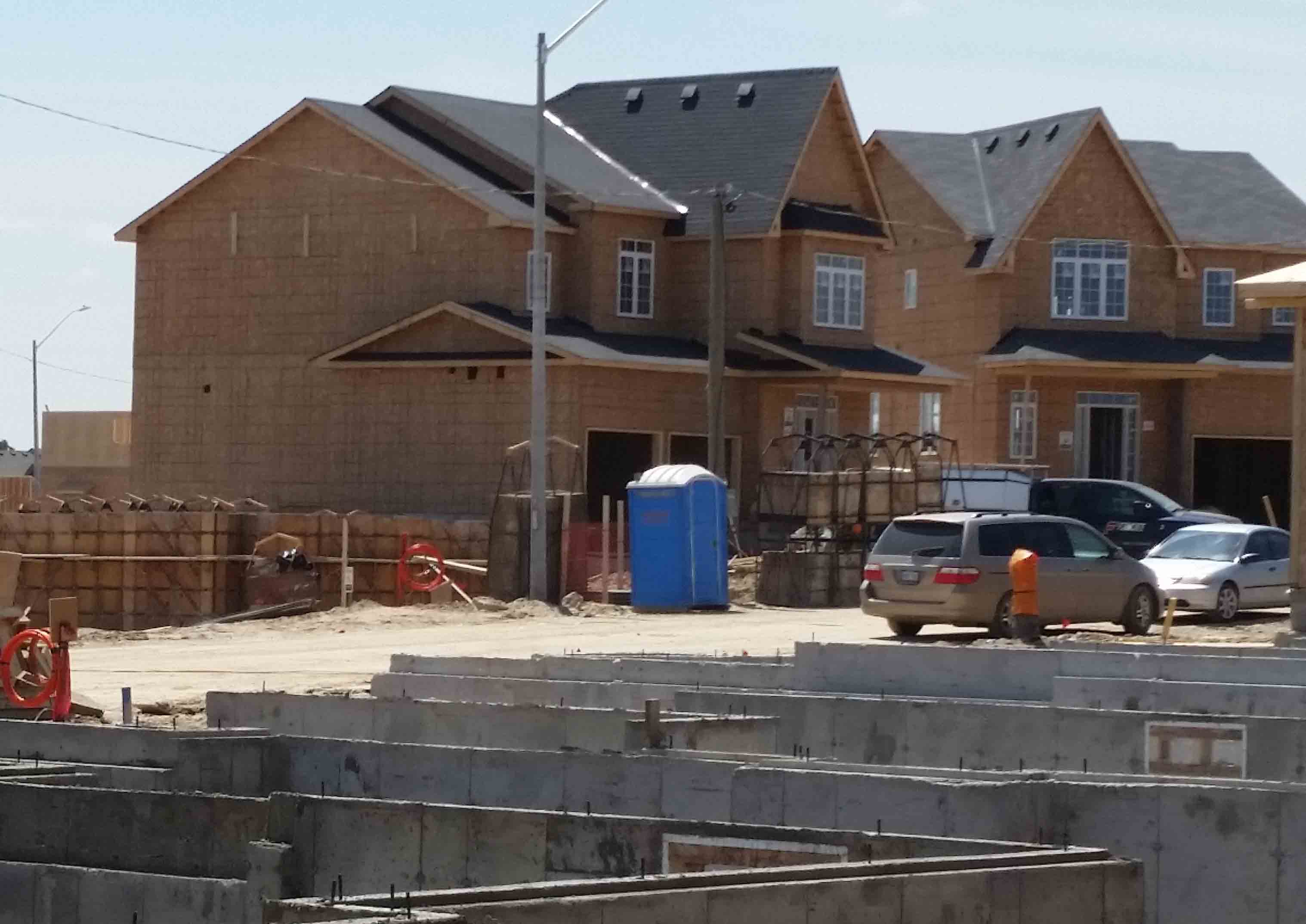 row of new houses being built
